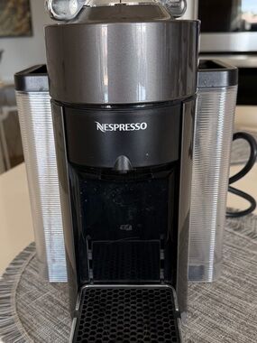 Nespresso Single-Serve Coffee Machine in Black and Silver